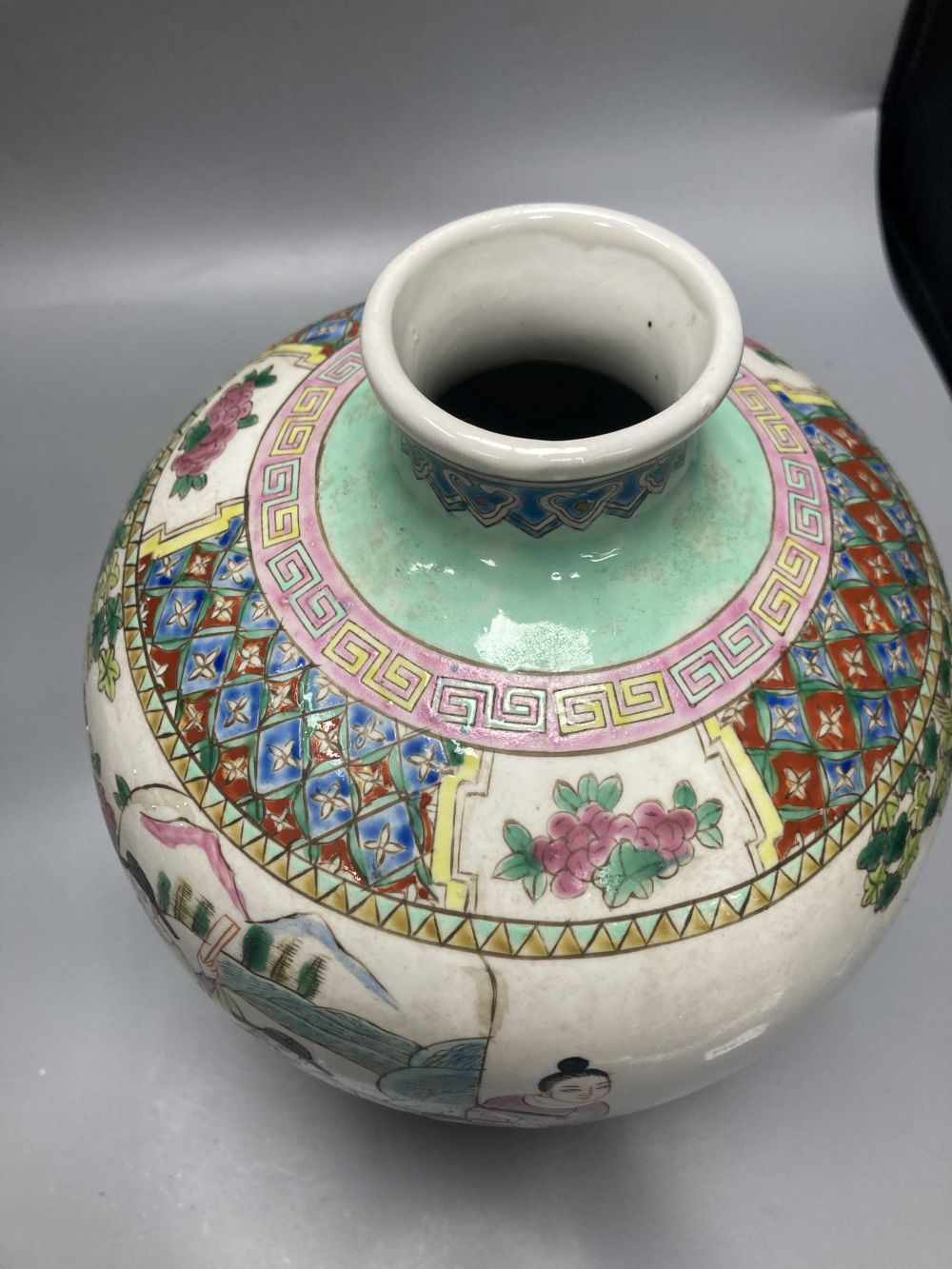 Two 19th century Chinese famille rose vases and another vase, tallest 29cm